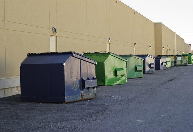 construction waste bins waiting to be picked up by a waste management company in Apollo Beach